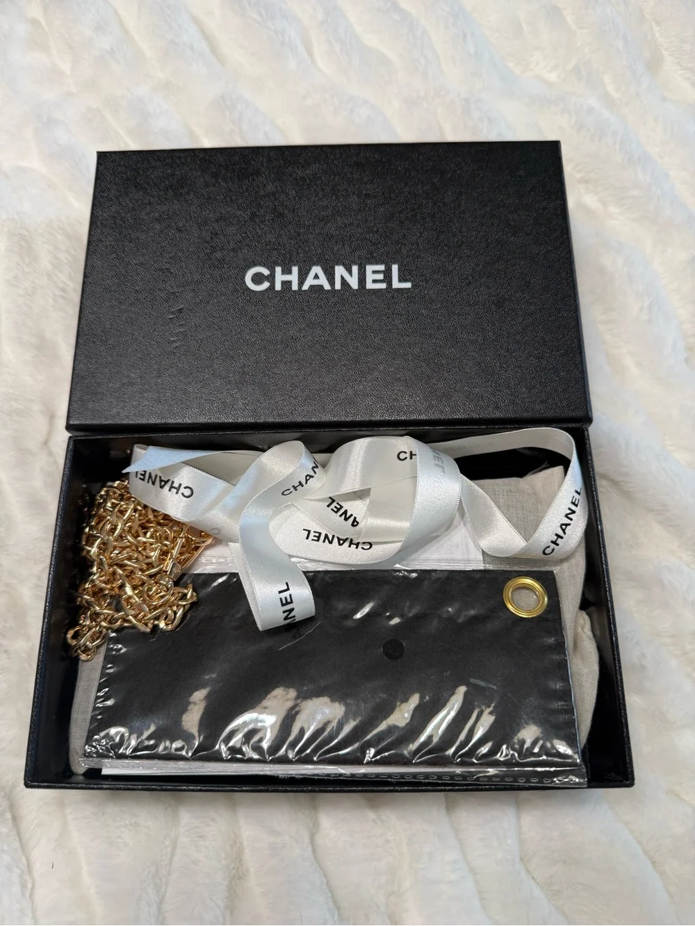 CHANEL Black Quilted Leather Clutch with Oversized CC Accent
